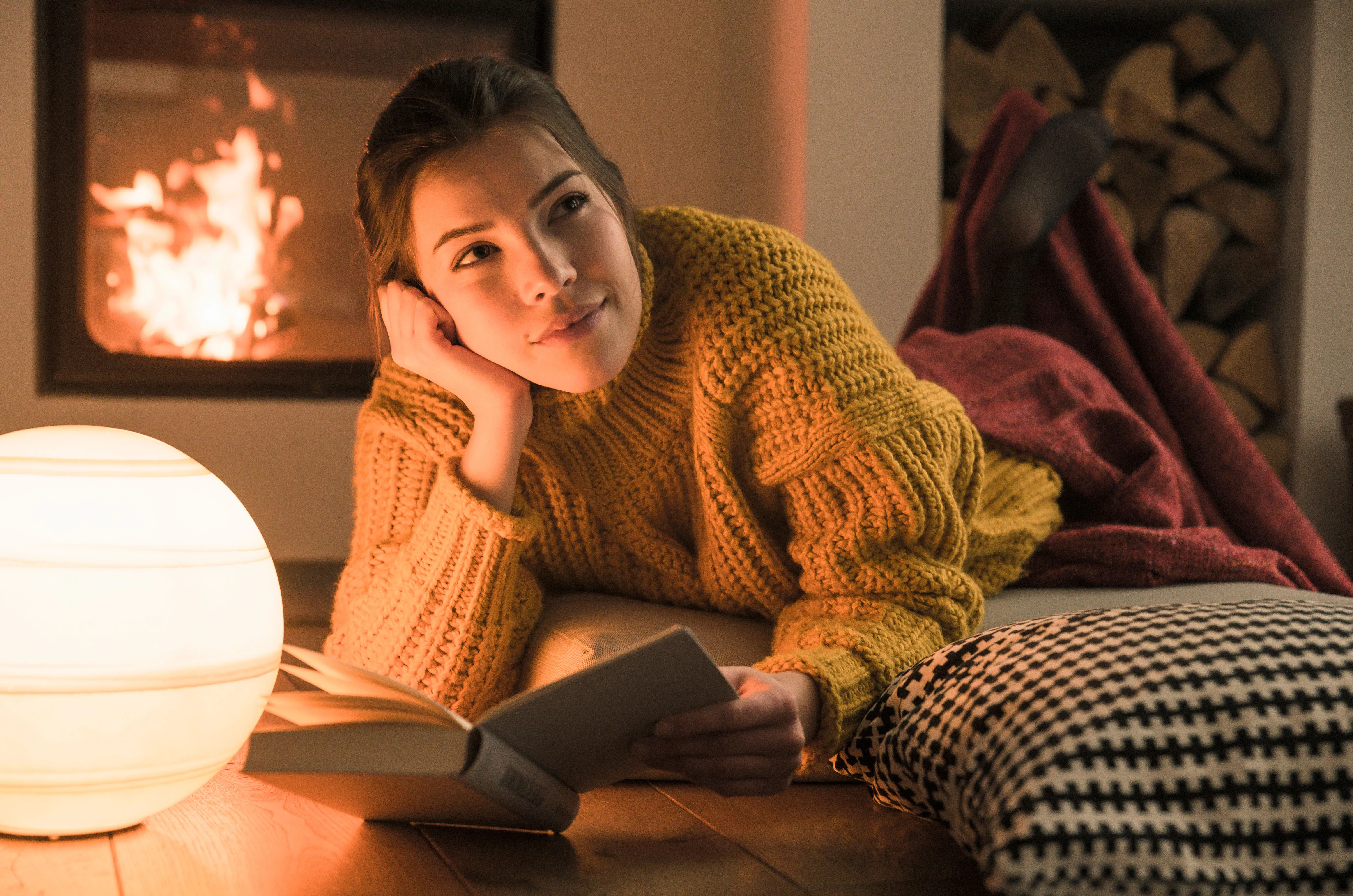Dimly lit interior with soft warm lamp glow
